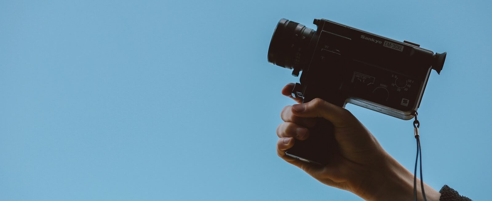 person holding video camera